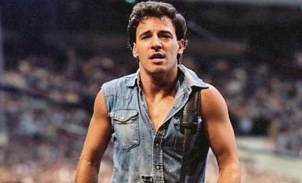 Wearing a Bruce Springsteen costume with confidence is all about embodying the spirit of The Boss